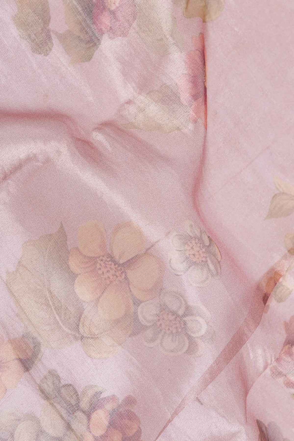 Close up of Lavender Dual Tone Organza Silk Saree with Printed design on the body and Zari Border displaying folds