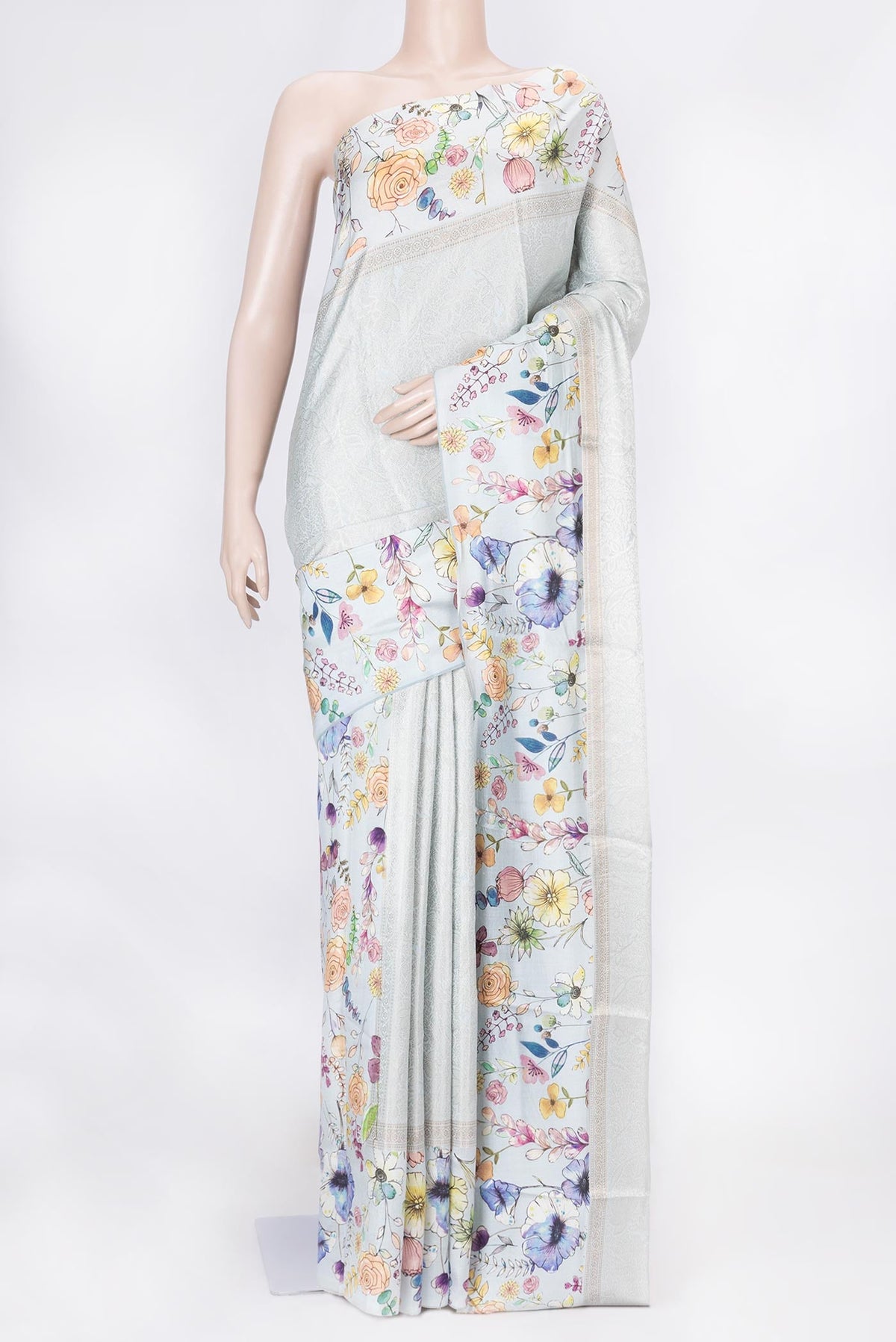 Grey Dual Tone Tussar Saree with Zari Brocade on the body and Fancy Border displayed on a mannequin