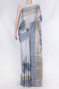 Grey Dual Tone Tussar Saree with Stripes on the body and Zari And Thread Border displayed on a mannequin