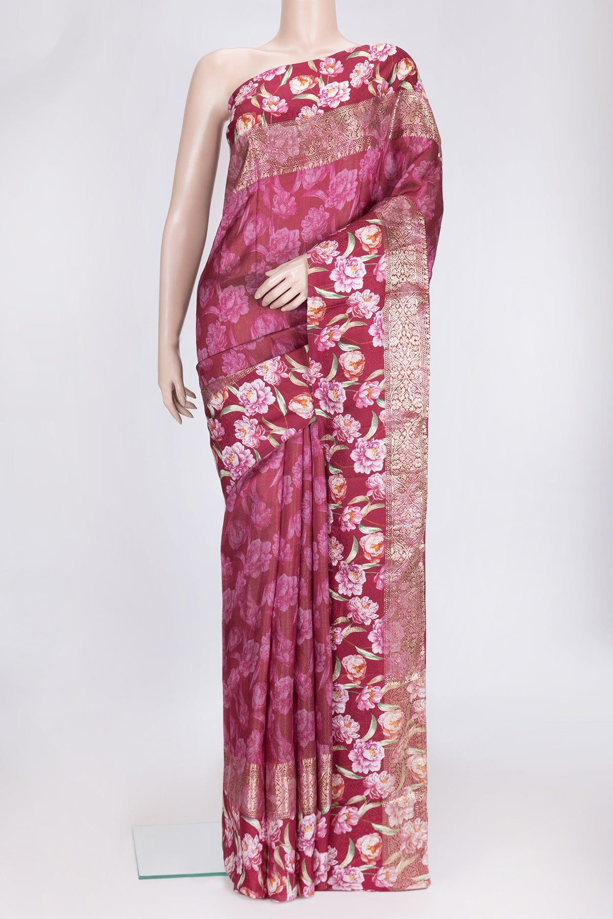 Maroon Dual Tone Tussar Silk Saree with Printed design on the body and Zari Border.  displayed on a mannequin