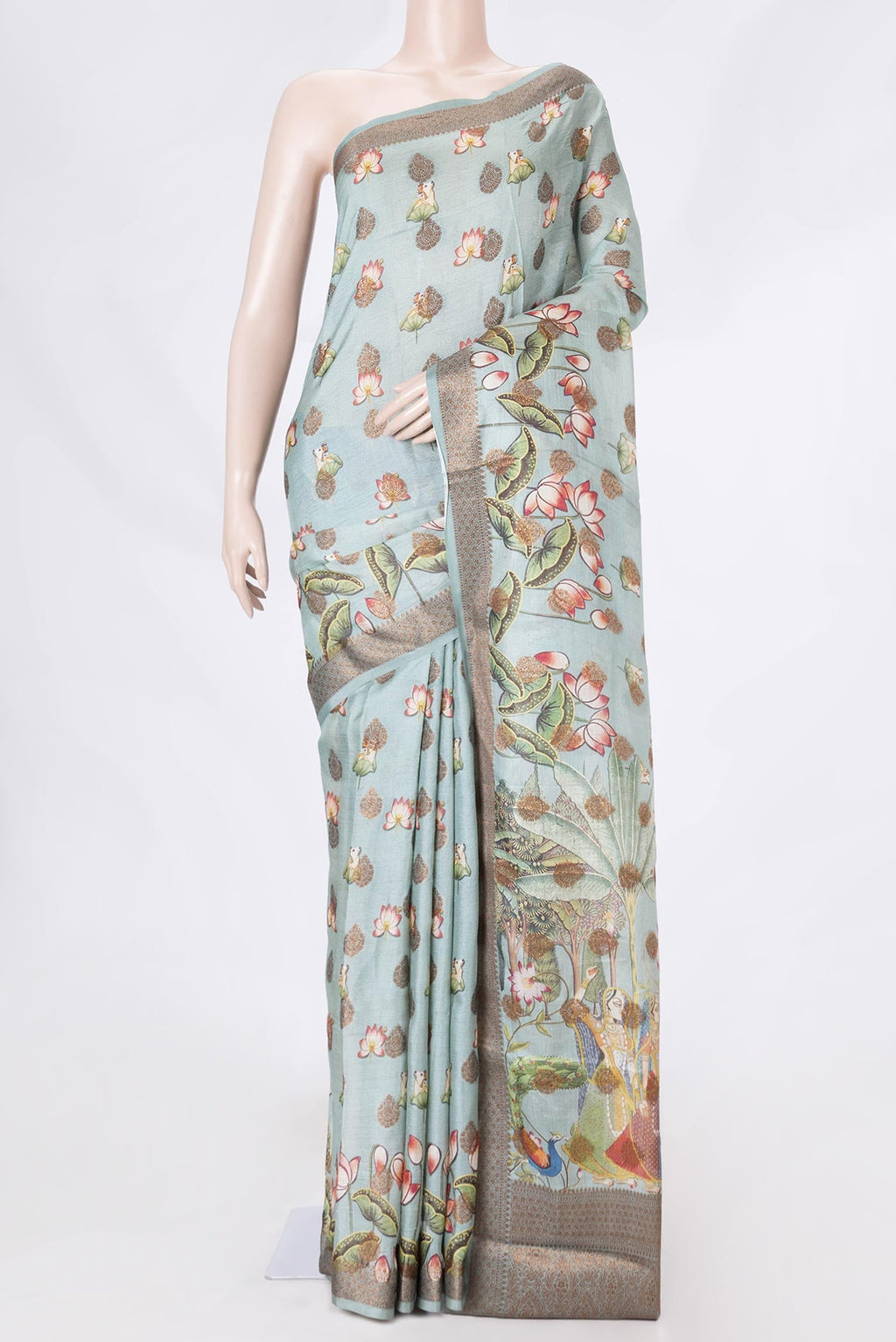 Grey Dual Tone Tussar Saree with Zari Butta on the body and Zari Border displayed on a mannequin