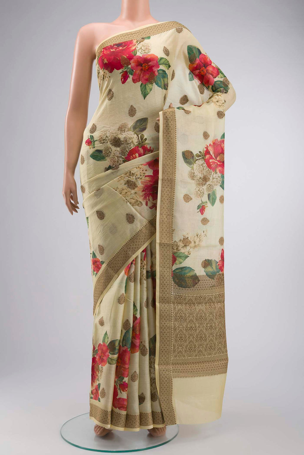 Yellow Tussar Silk Saree with Printed design on the body and Zari Border displayed on a mannequin