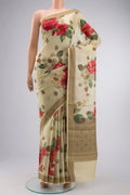 Yellow Tussar Silk Saree with Printed design on the body and Zari Border displayed on a mannequin