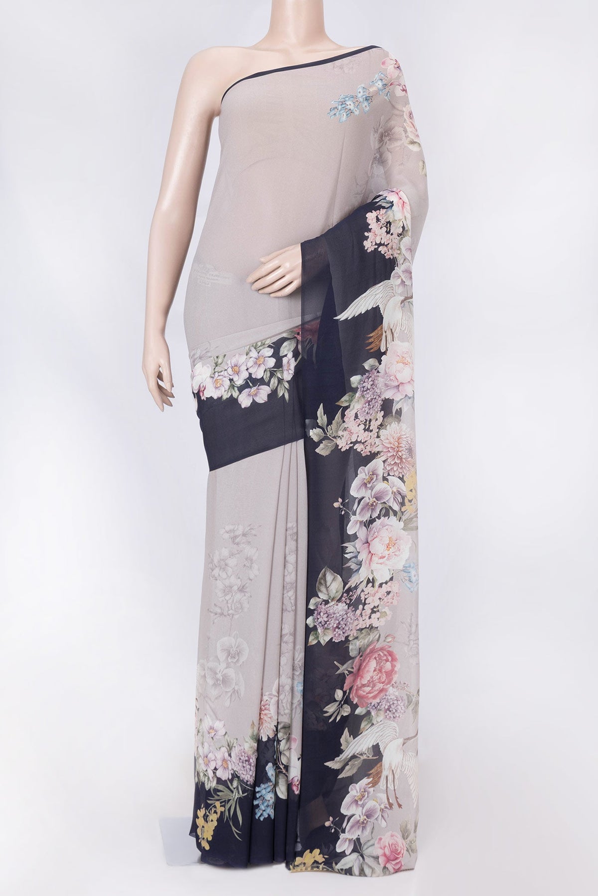 Grey Dual Tone Mysore Georgette Saree with Printed design on the body and Plain Border displayed on a mannequin