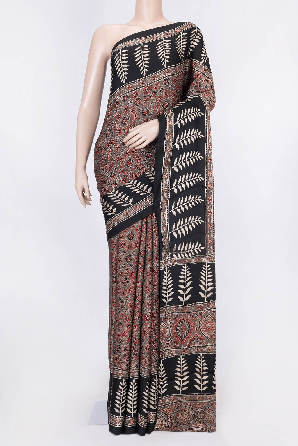 Brown Dual Tone Linen Saree with Printed design on the body and Zari Border displayed on a mannequin