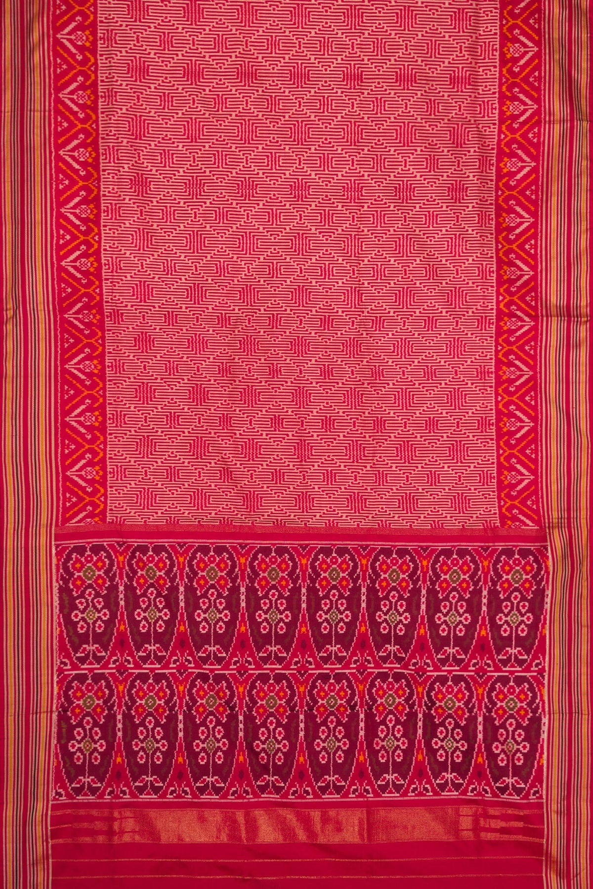 Flat view of Maroon Dual Tone Double Ikat Saree with Ikat Print on the body and Thread Border. 