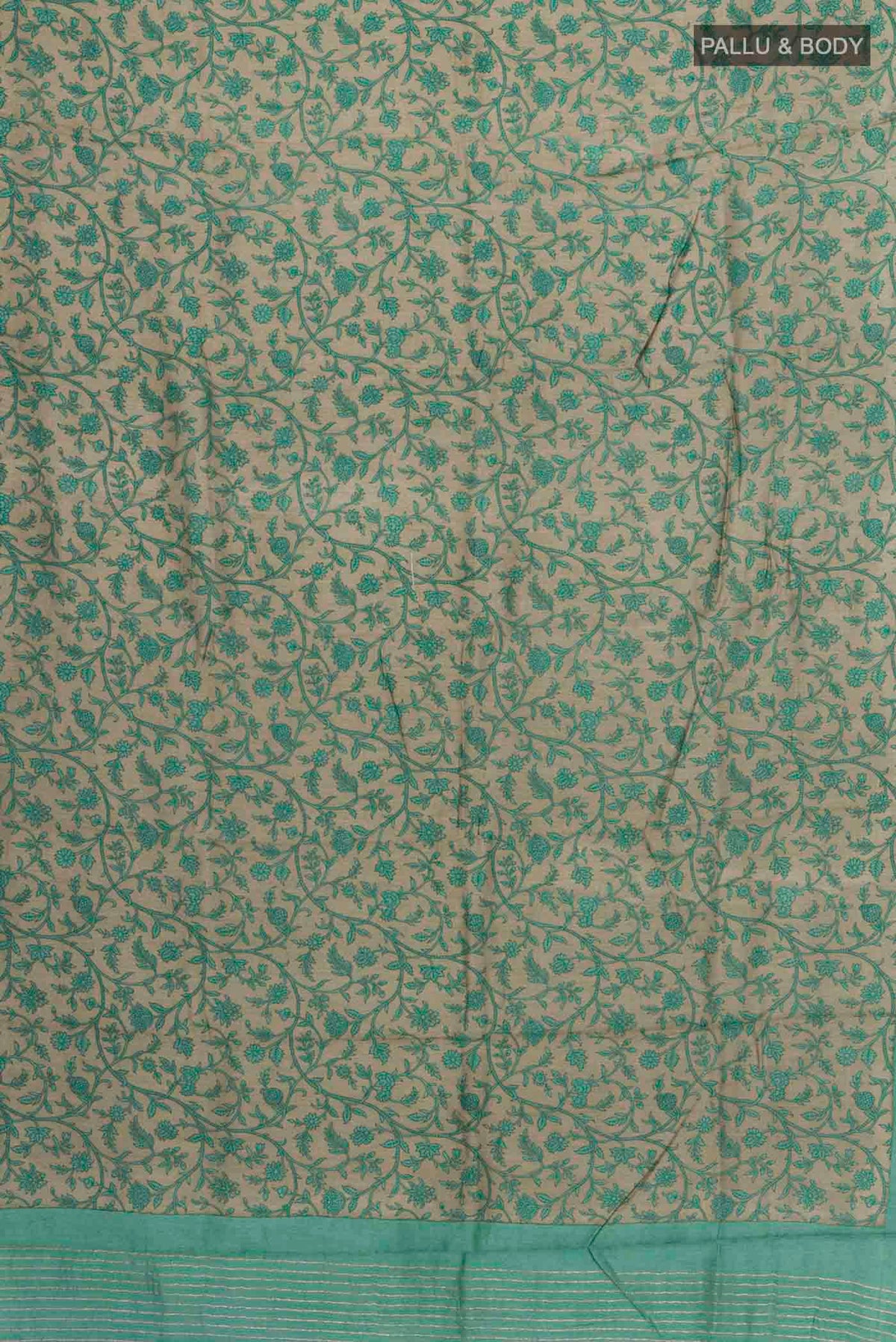 Flat view of Green Tussar Silk Saree with Printed design on the body and Zari Border