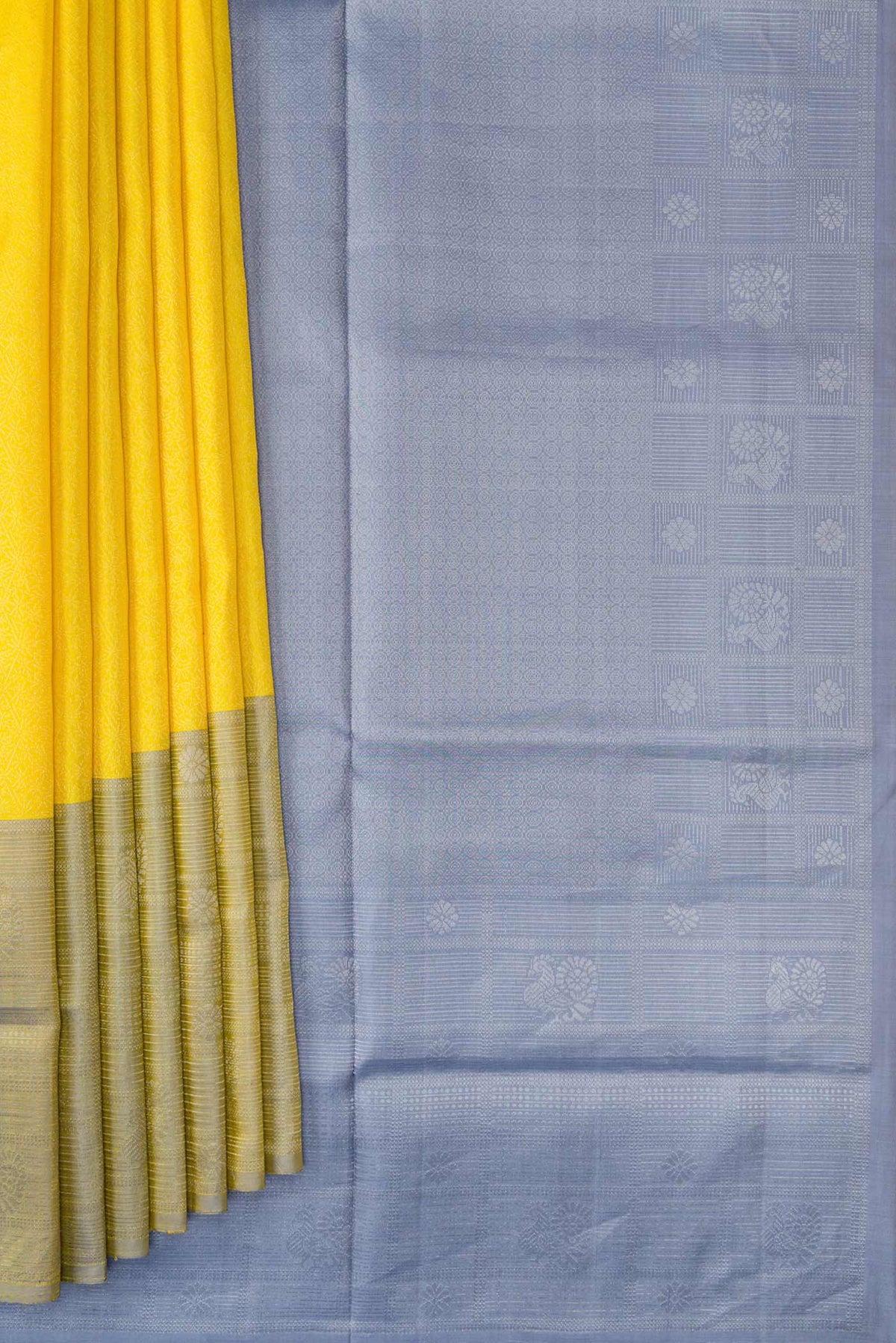Pleats and pallu of Yellow Dual Tone Soft Silk Saree with Zari Brocade on the body and Zari Border. 