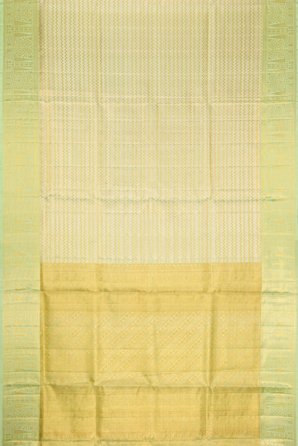 Flat view of Pista Green Dual Tone Kanjivaram Tissue Silk Saree with Zari Brocade on the body and Zari Border. 
