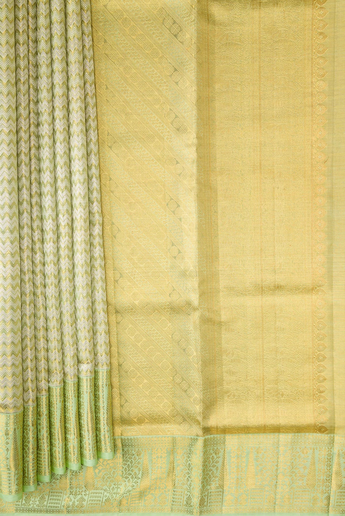Pleats and pallu of Pista Green Dual Tone Kanjivaram Tissue Silk Saree with Zari Brocade on the body and Zari Border. 