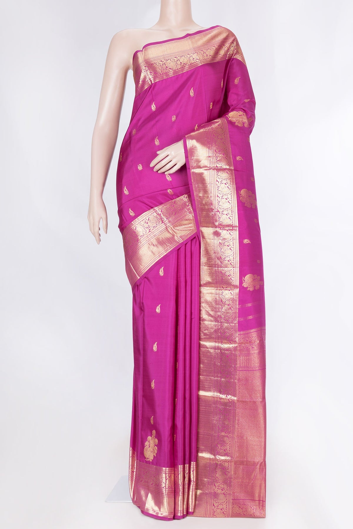 Magenta Dual Tone Kanchipuram Saree with Zari Butta on the body and Zari Border displayed on a mannequin