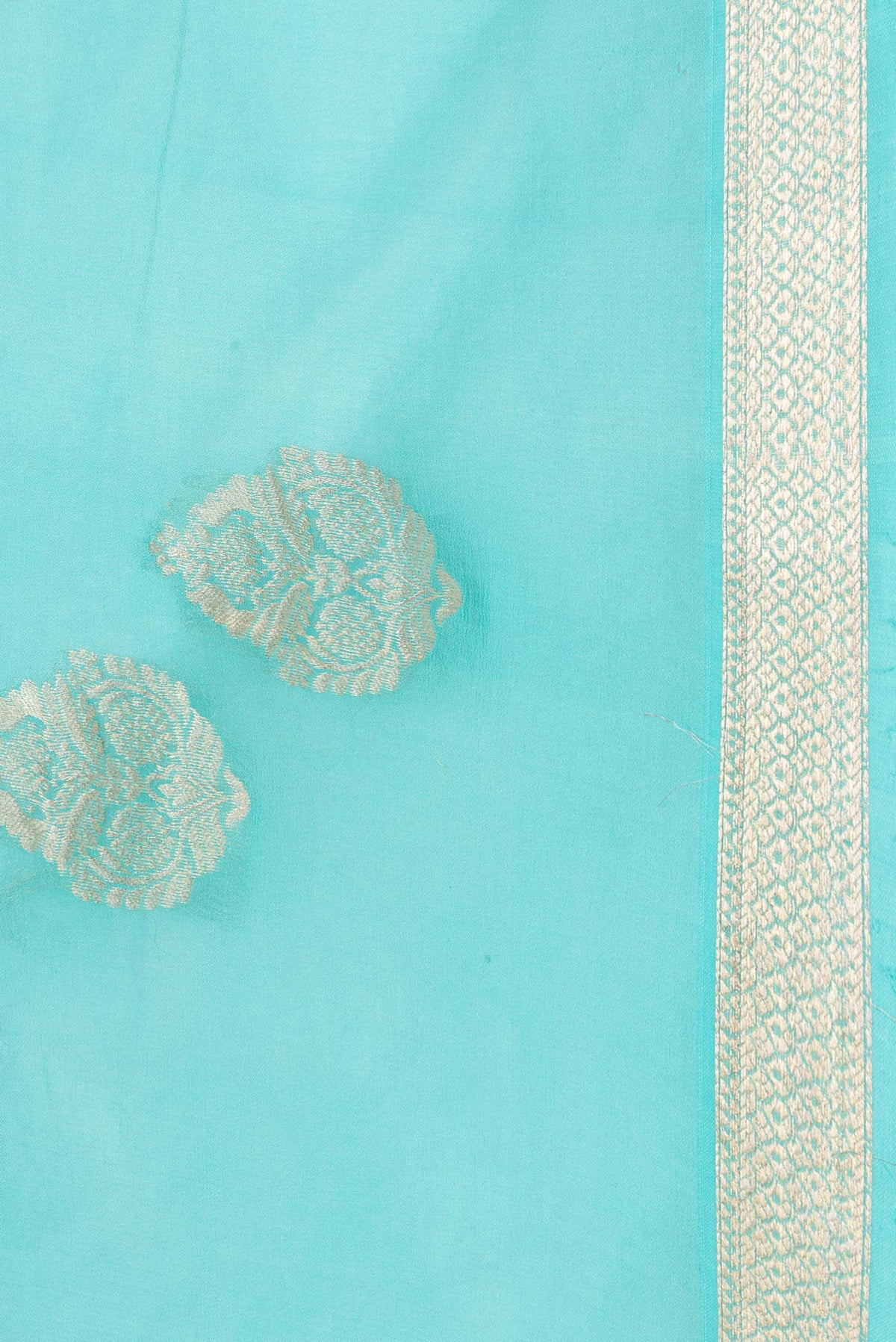 Border image of Sky Blue Dual Tone Mysore Georgette Saree with Zari Butta on the body and Zari Border. 