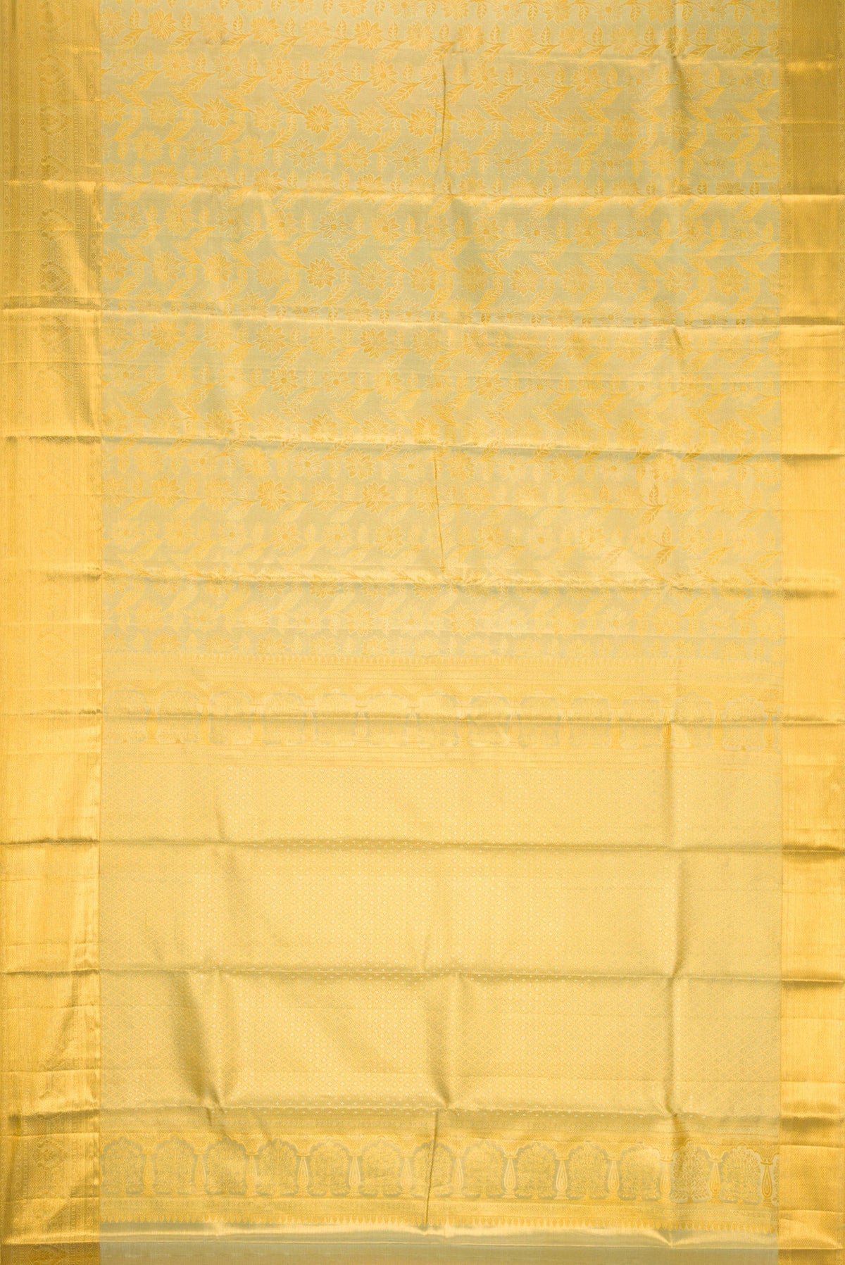 Flat view of Pista Green Dual Tone Kanchipuram Tissue Silk Saree with Zari Brocade on the body and Zari Border. 