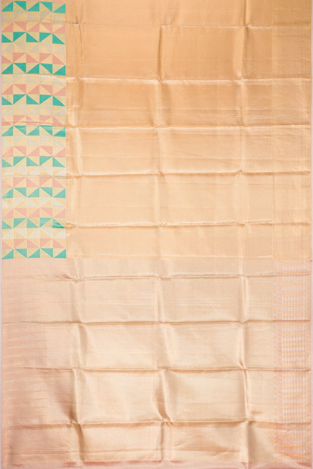 Flat view of Gold Dual Tone Kanjivaram Tissue Silk Saree with Zari Brocade on the body and Fancy Border. 