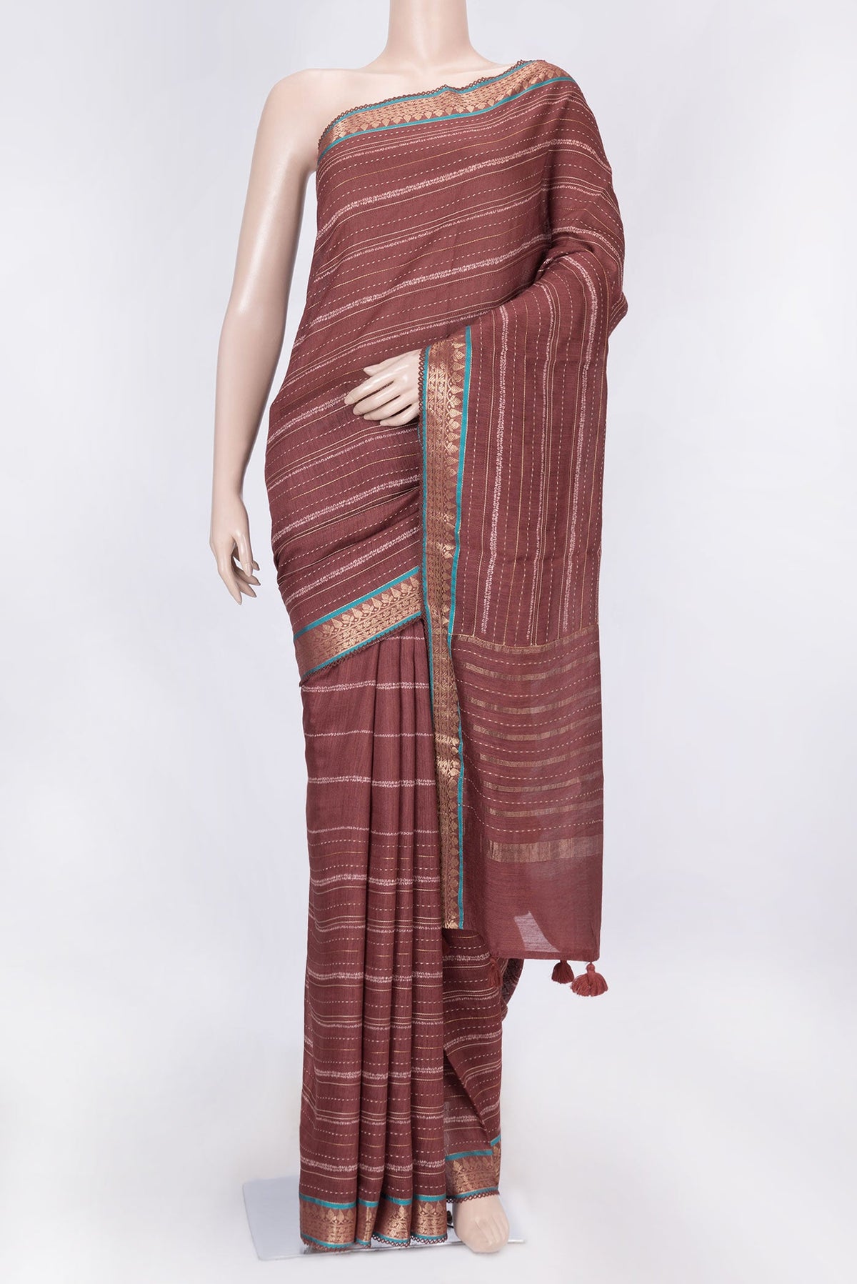 Maroon Dual Tone Tussar Silk Saree with Embroidery on the body and Embroidery Border displayed on a mannequin