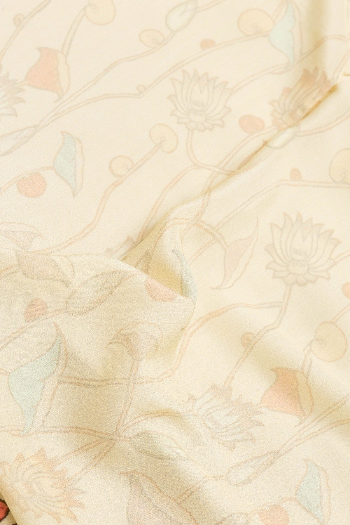 Close up of Sandal Dual Tone Mysore Crepe Saree with Printed design on the body and Plain Border.  displaying folds