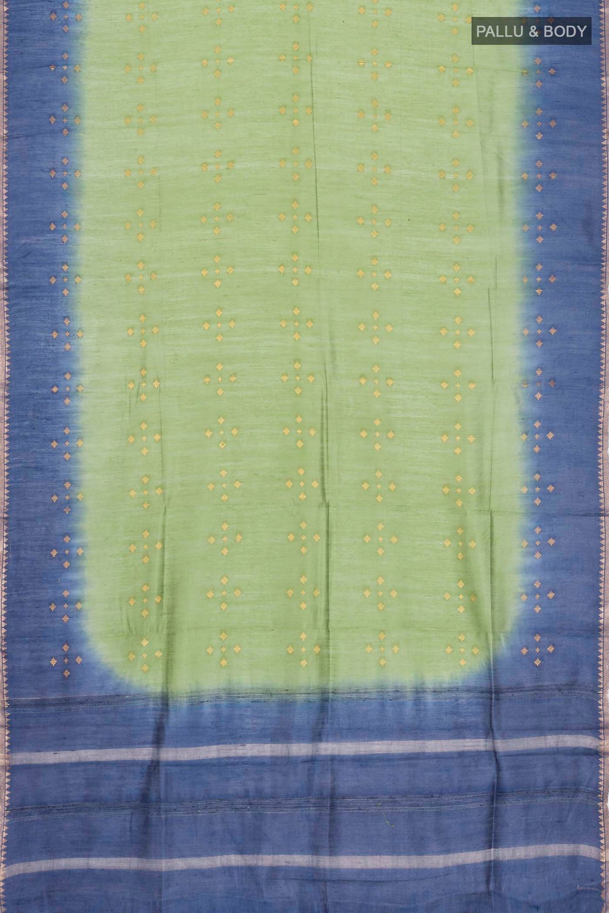 Flat view of Green Tussar Silk Saree with Zari Butta on the body and Zari Border