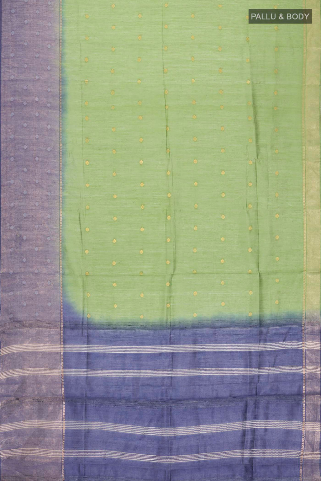 Flat view of Green Tussar Silk Saree with Zari Butta on the body and Zari Border