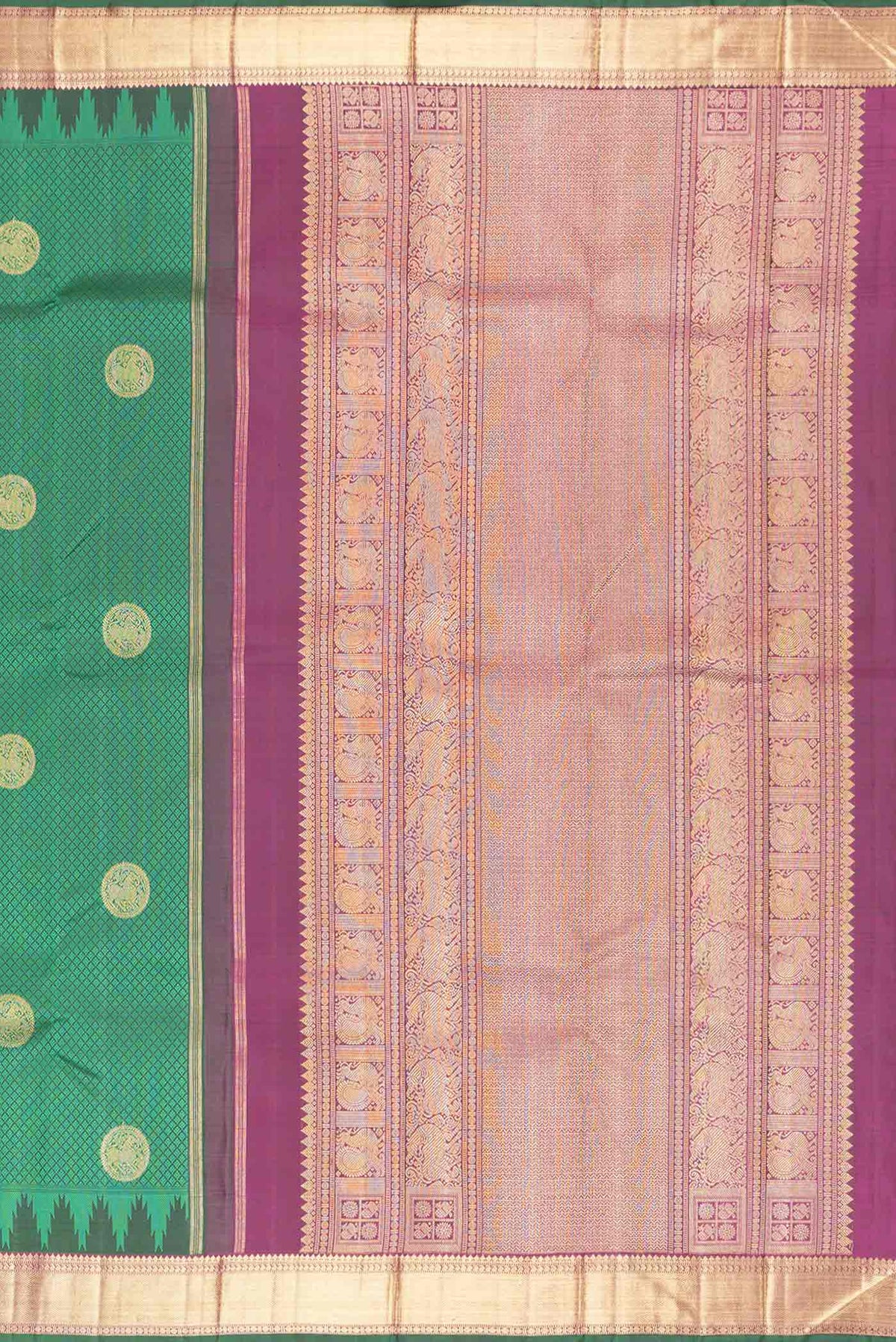 Close up image of the pallu of Pure Silk Pure Zari Green Dual Tone Kanchipuram Saree with Jacquard With Zari Butta on the body and Zari Border