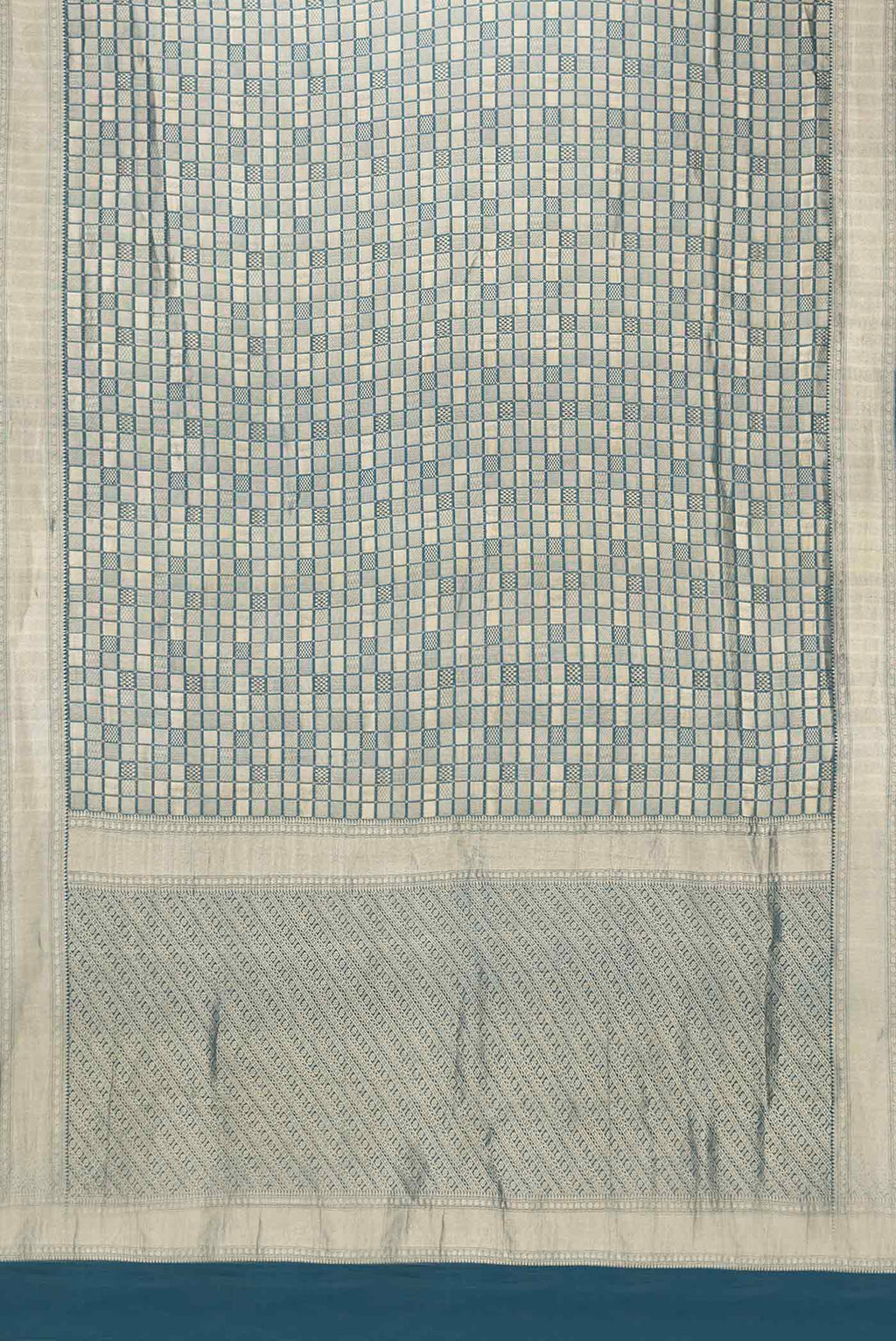 Flat view of Sky Blue Dual Tone Mysore Georgette Saree with Zari Brocade on the body and Zari Border