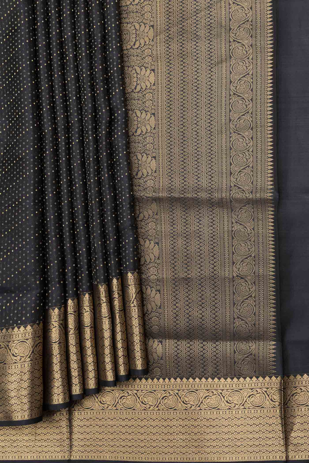Pleats and pallu of Black Dual Tone Soft Silk Saree with Zari Brocade on the body and Zari Border. 