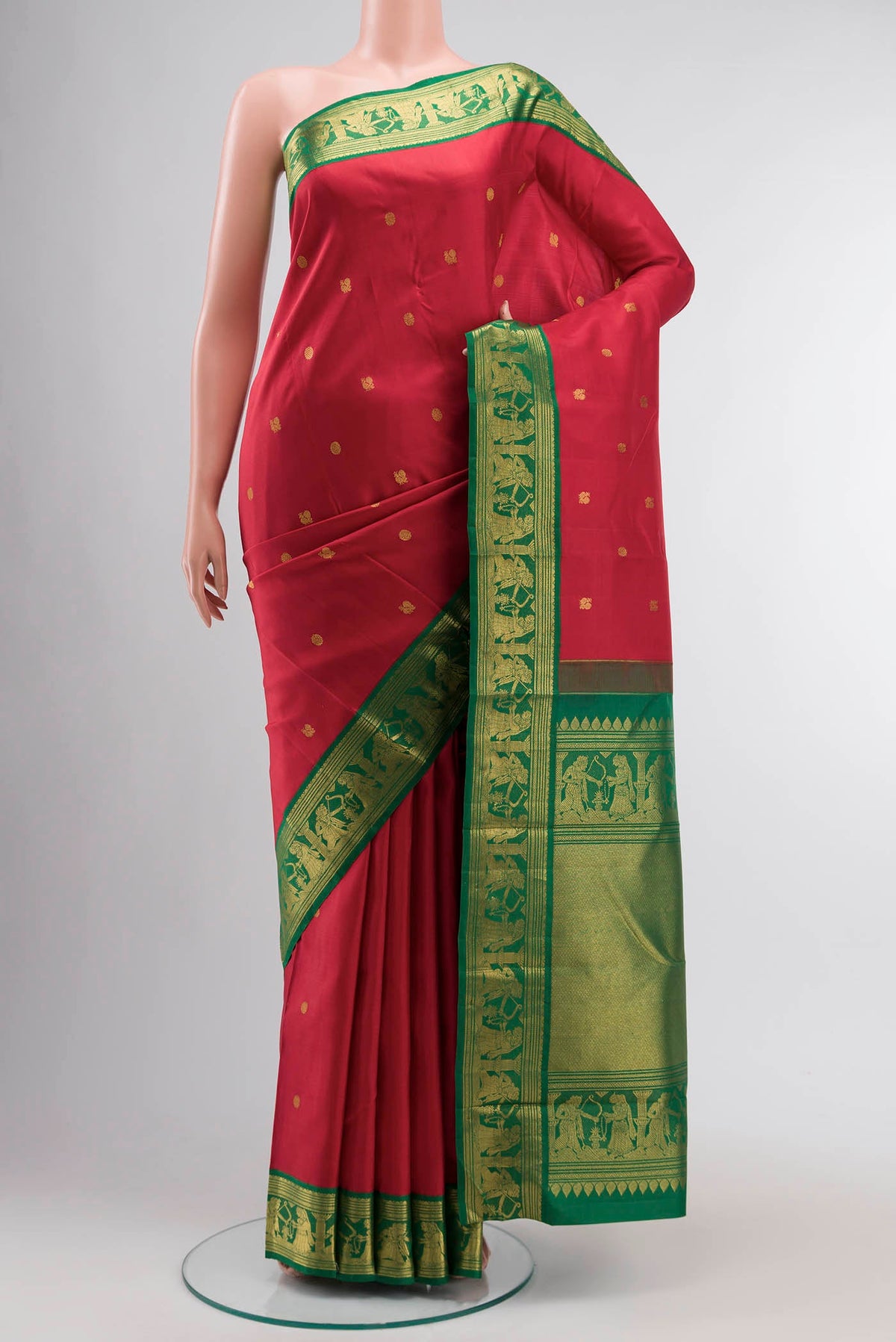 Red Kanchipuram Silk Saree with Zari Butta on the body and Zari Border displayed on a mannequin