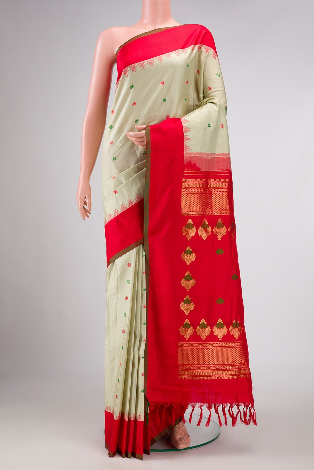 Light Green Dual Tone Gadwal Silk Saree with Zari Butta on the body and Zari Border displayed on a mannequin
