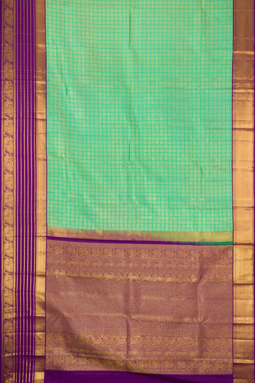 Flat view of Green Dual Tone Kanjivaram Silk Saree with Zari Brocade on the body and Zari Border. 