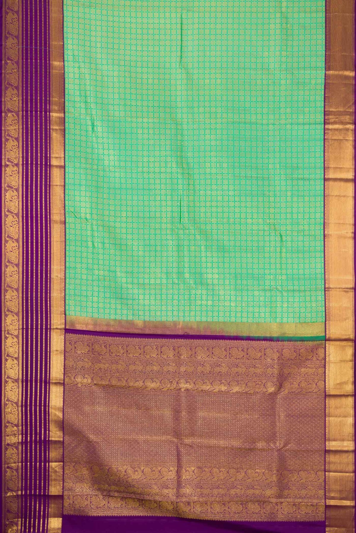Flat view of Green Dual Tone Kanjivaram Silk Saree with Zari Brocade on the body and Zari Border. 