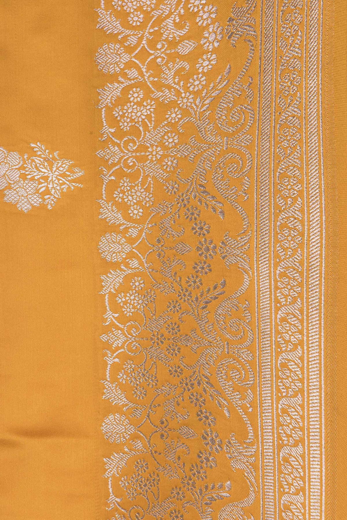 Border image of Yellow Dual Tone Banarasi Silk Saree with Zari Butta on the body and Zari Border. 