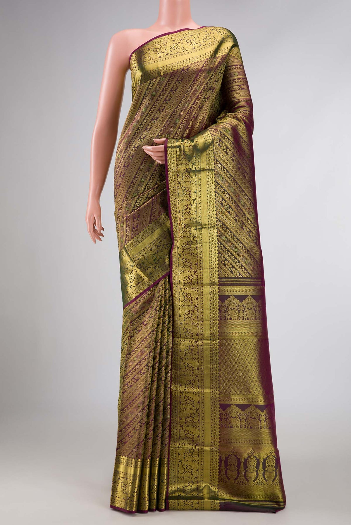 Burgundy Dual Tone Kanchipuram Silk Saree with Zari Brocade on the body and Zari Border displayed on a mannequin