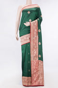 Bottle Green Dual Tone Banarasi Silk Saree with Zari And Thread Butta on the body and Zari Border displayed on a mannequin