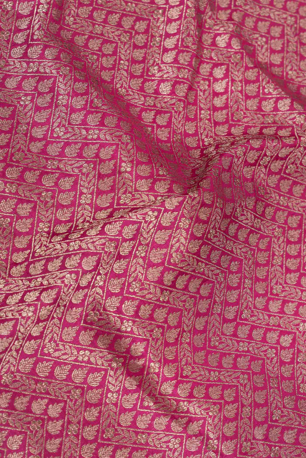 Close up of Dark Pink Dual Tone Banarasi Silk Saree with Zari Brocade on the body and Zari Border displaying folds