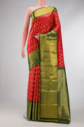 Red Dual Tone Kanchipuram Silk Saree with Zari Brocade on the body and Zari Border.  displayed on a mannequin