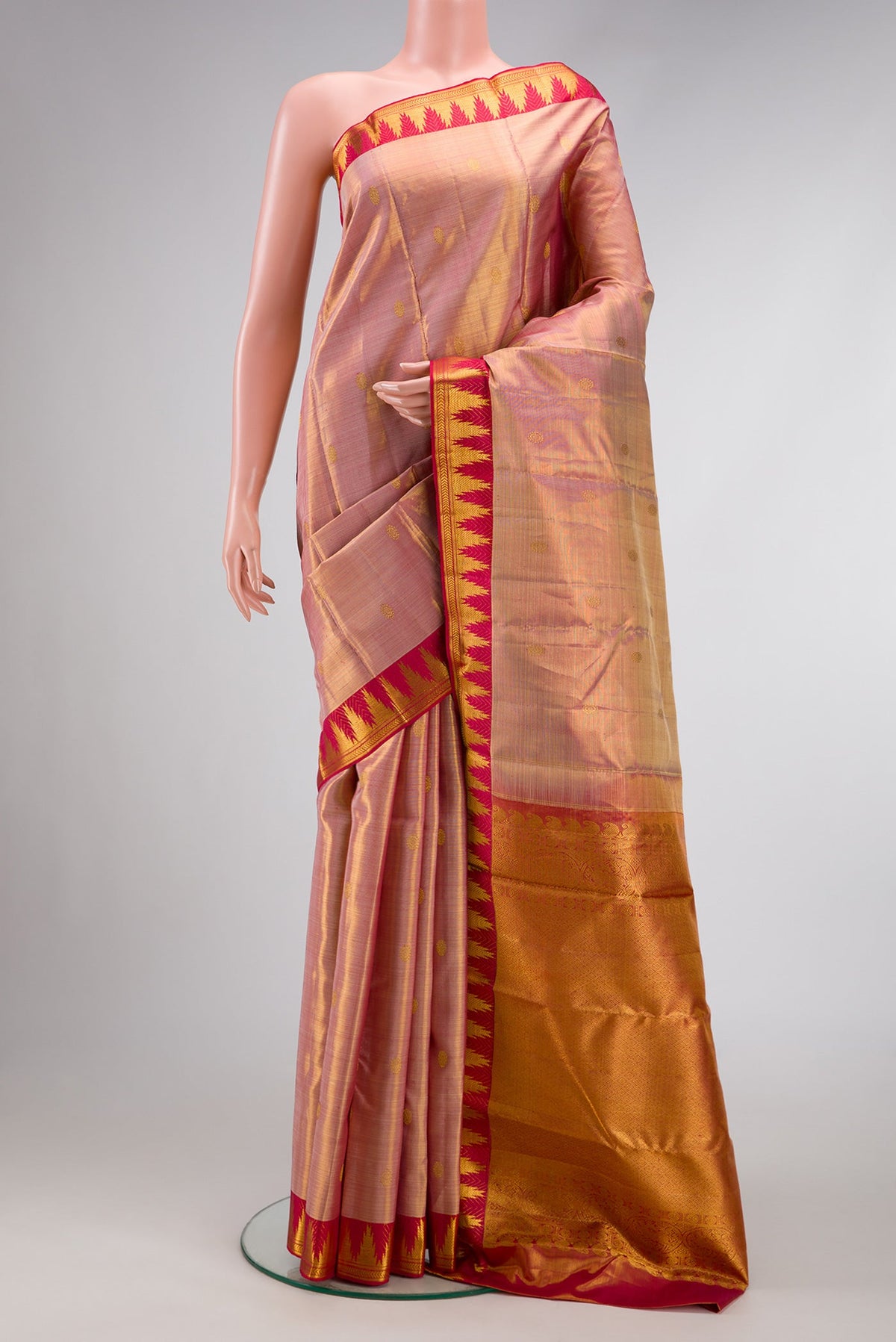 Rose Gold Dual Tone Kanchipuram Tissue Silk Saree with Zari Brocade on the body and Zari Border.  displayed on a mannequin