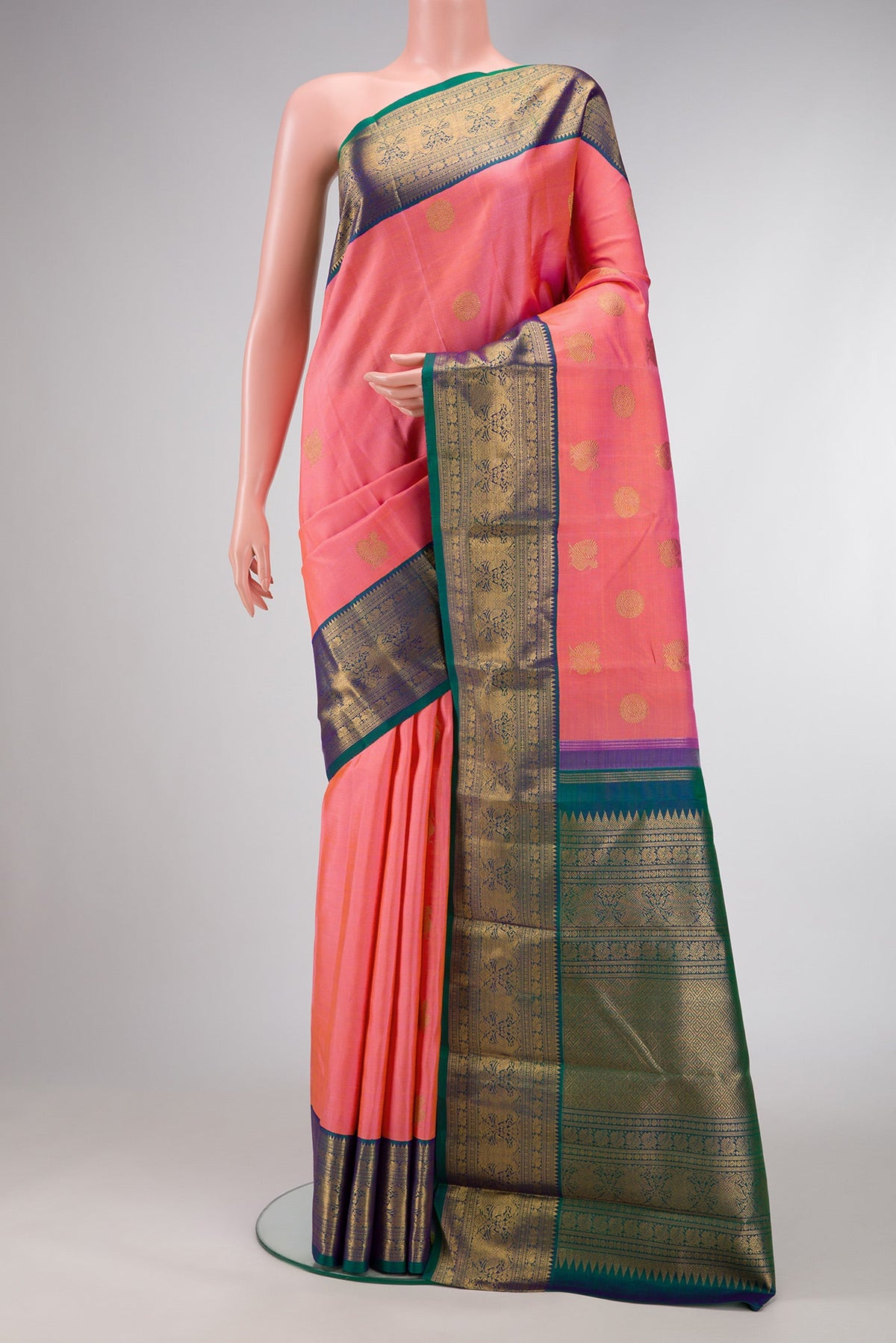 Pure Silk Pure Zari Pink Dual Tone Kanjivaram Saree with Zari Butta on the body and Zari Border.  displayed on a mannequin