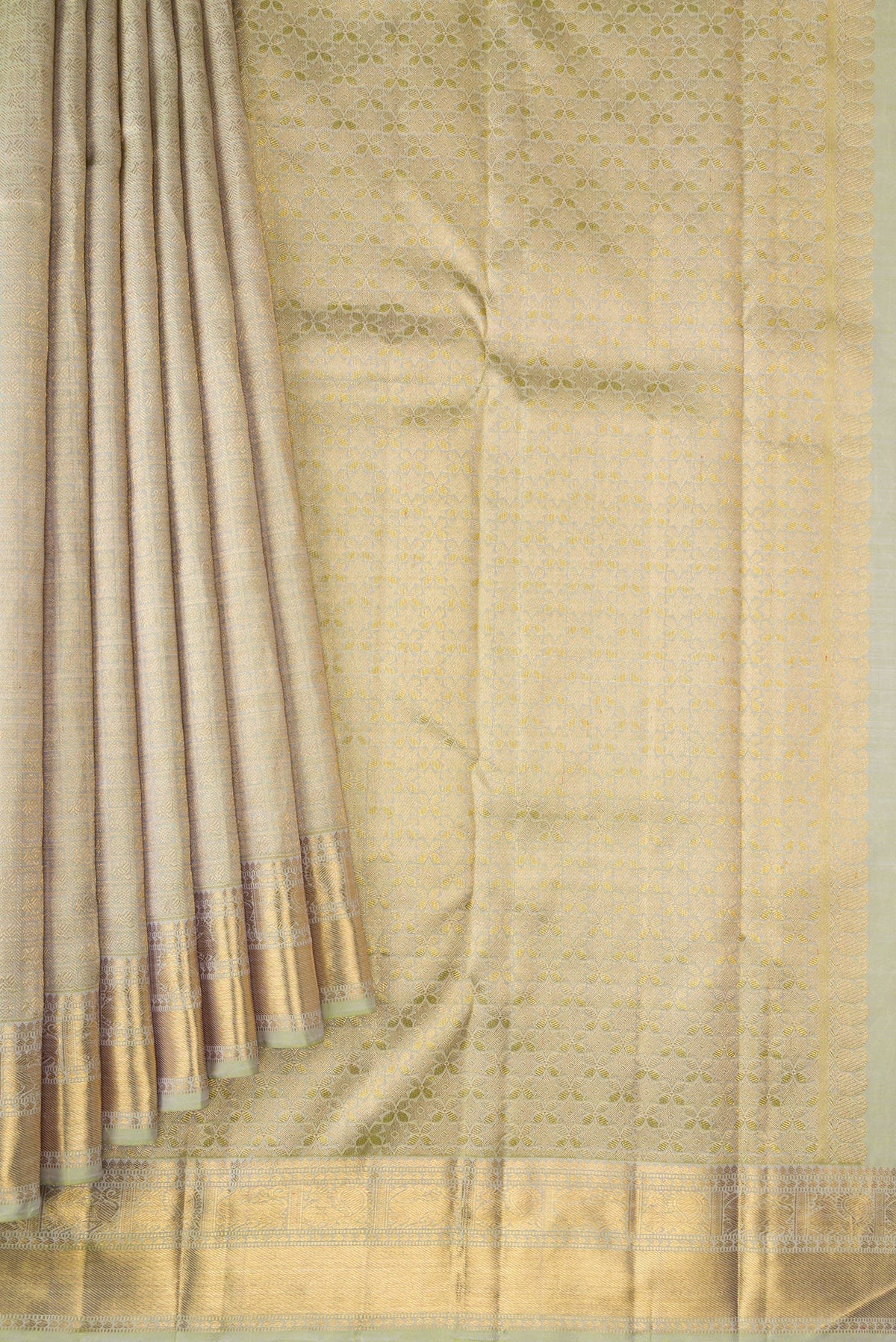 Pleats and pallu of Pure Silk Pure Zari Light Green Dual Tone Kanjivaram Saree with Zari Brocade on the body and Zari Border. 