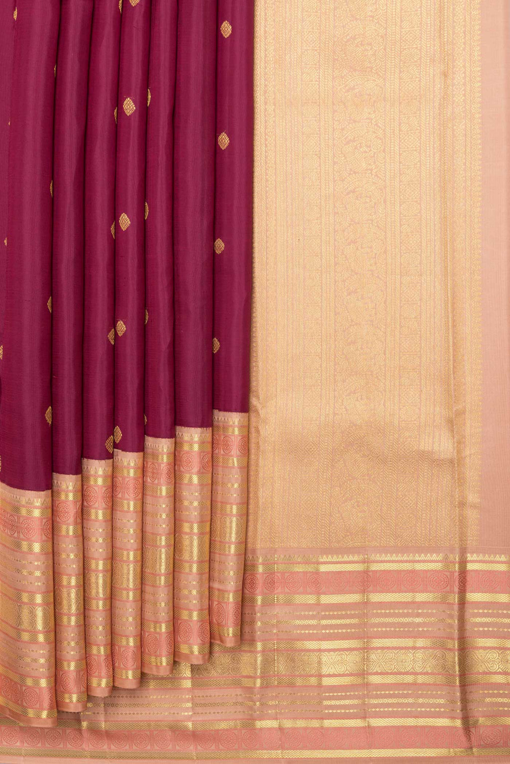 Pleats and pallu of Magenta Dual Tone Kanchipuram Saree with Zari Butta on the body and Zari And Thread Border