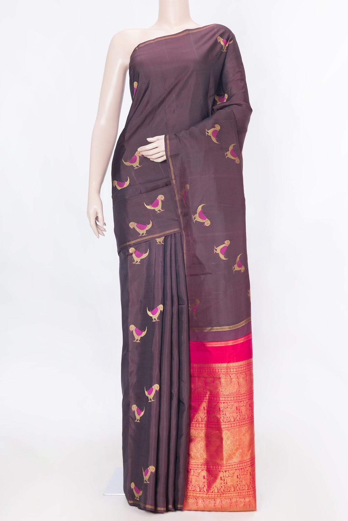 Pure Silk Pure Zari Coffee Brown Dual Tone Kanchipuram Saree with Zari And Thread Butta on the body and Zari Border displayed on a mannequin