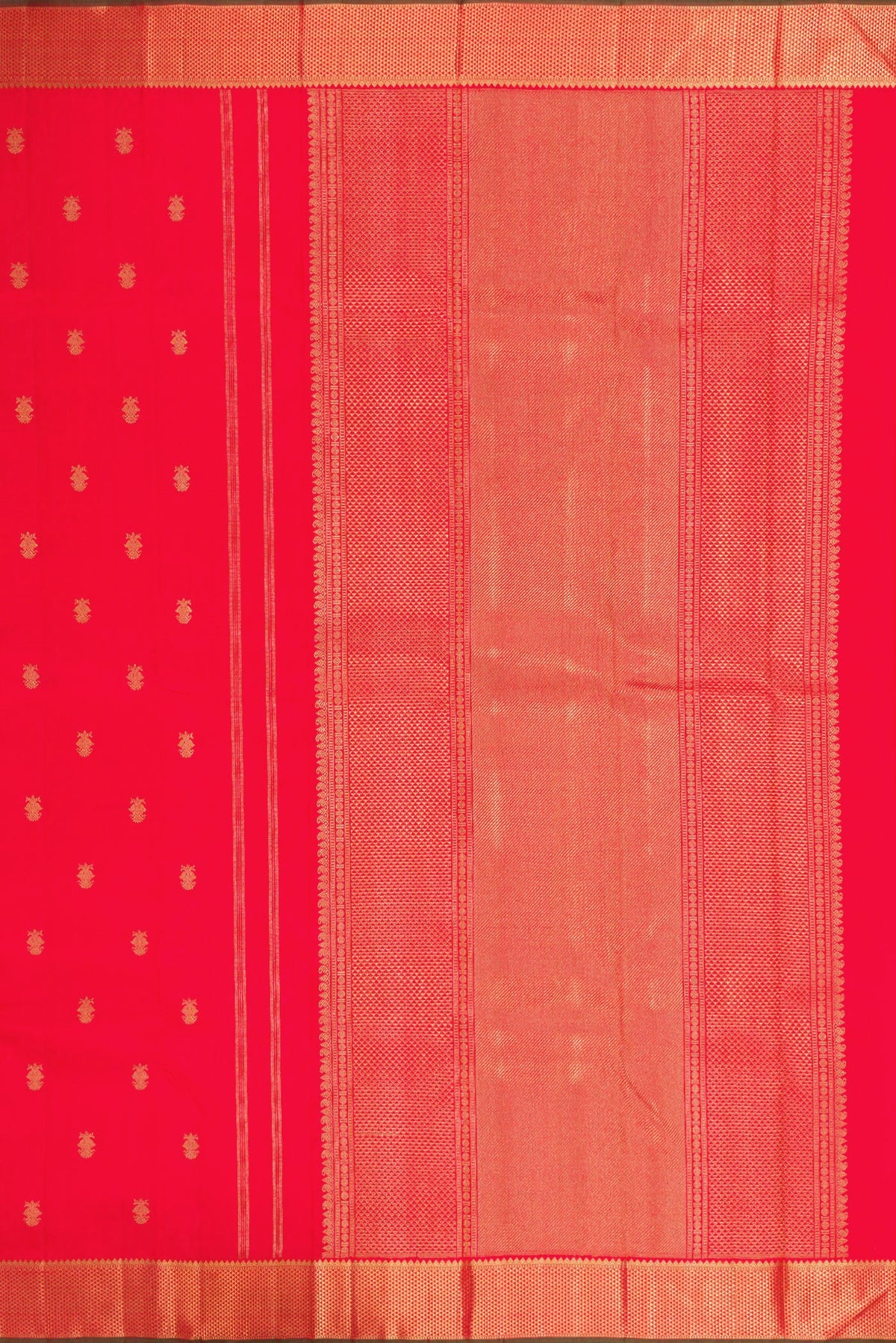 Close up image of the pallu of Red Dual Tone Kanchipuram Silk Saree with Zari Butta on the body and Zari Border. 