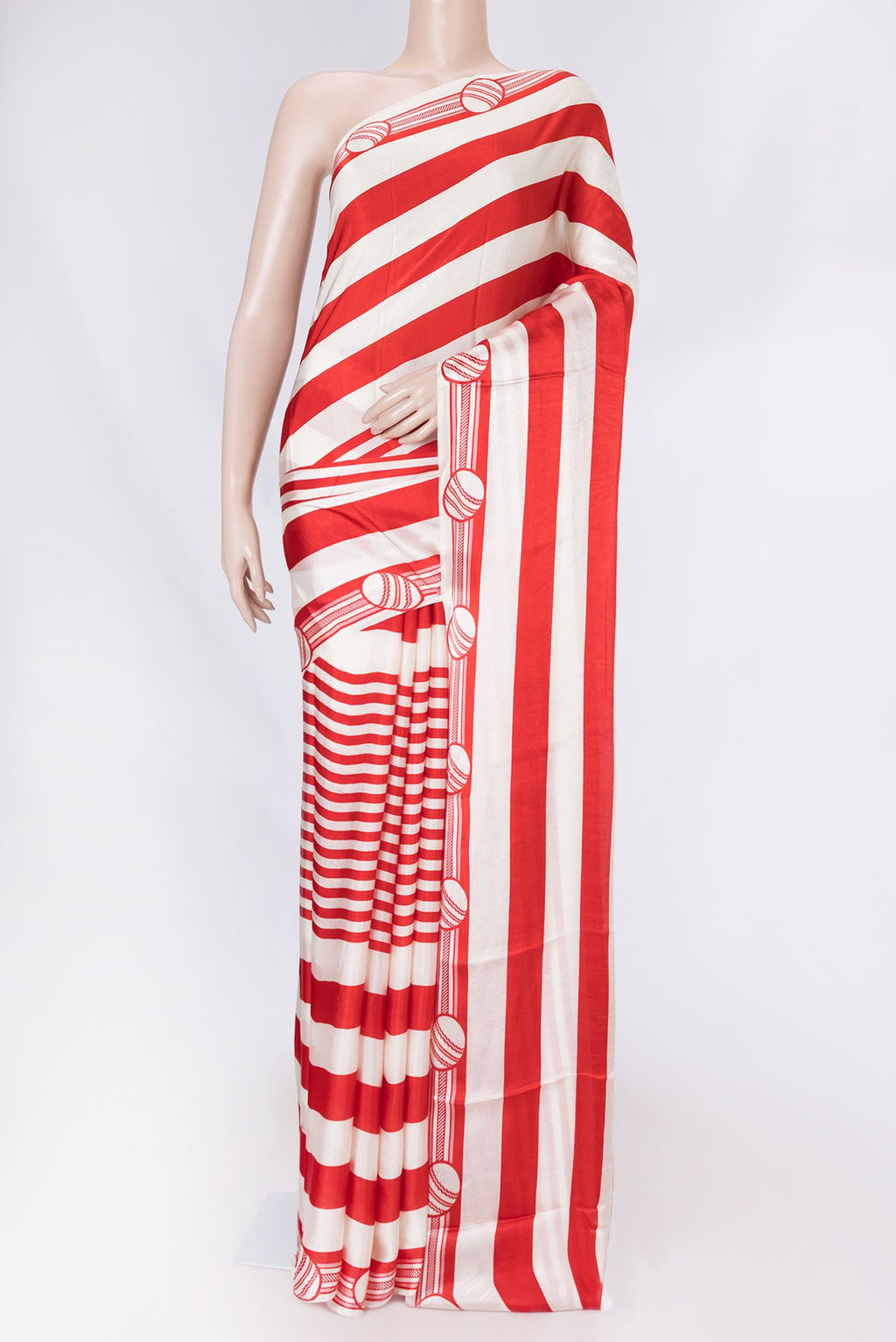 Red Dual Tone Mysore Crepe Saree with Printed design on the body and Printed Border displayed on a mannequin