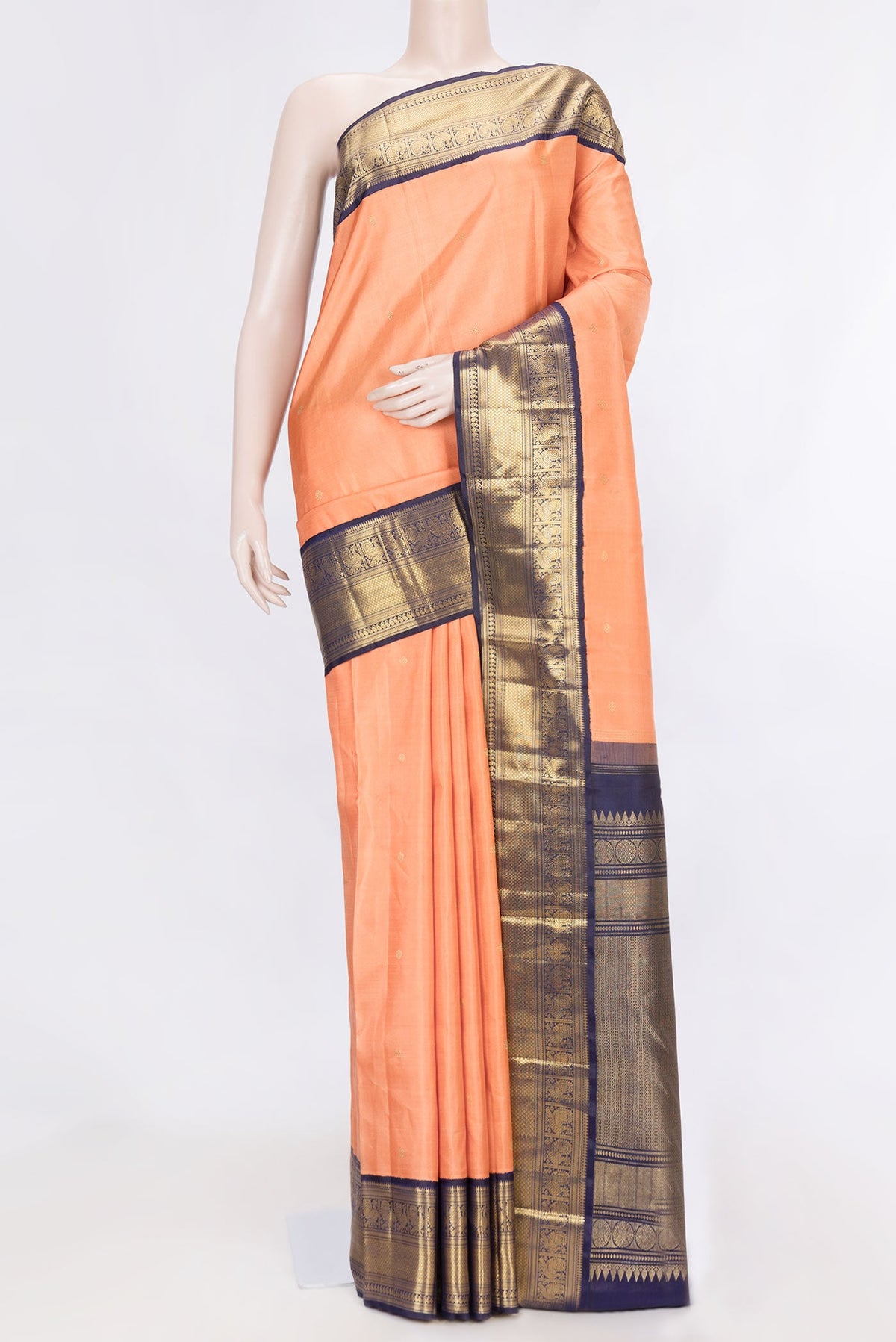 Orange Dual Tone Kanchipuram Silk Saree with Stripes on the body and Zari Border displayed on a mannequin