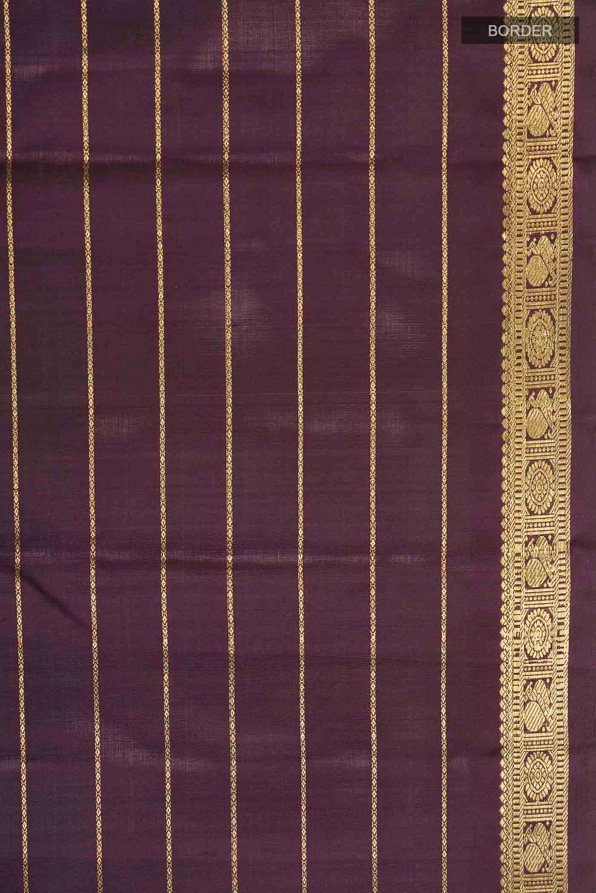 Border image of Brown Kanchipuram Silk Saree with Stripes on the body and Zari Border