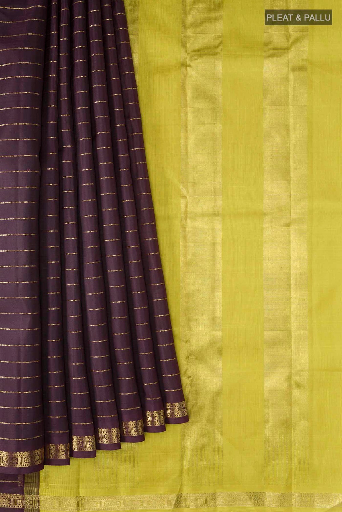 Pleats and pallu of Brown Kanchipuram Silk Saree with Stripes on the body and Zari Border