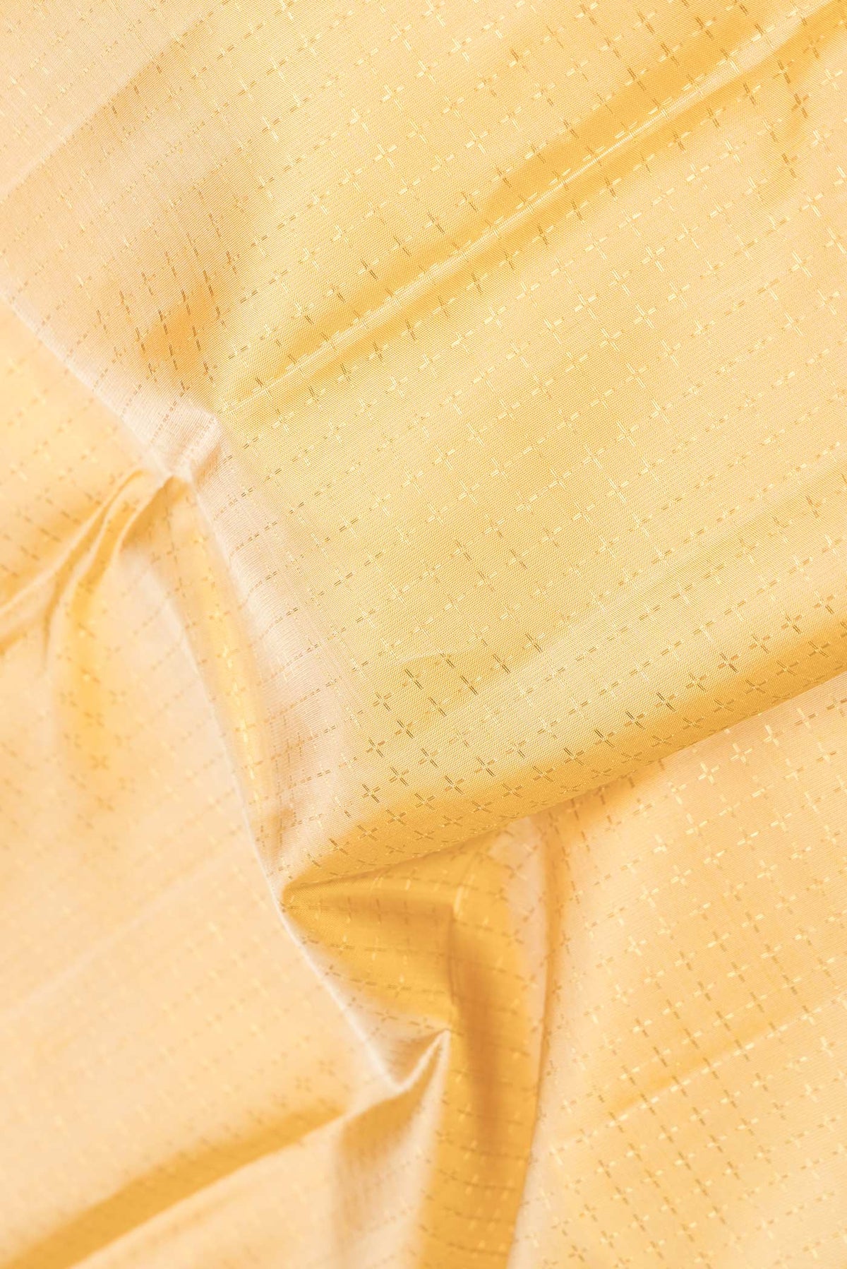 Close up of Pure Silk Pure Zari Sandal Dual Tone Kanchipuram Saree Checked design on the body and Zari Border displaying folds