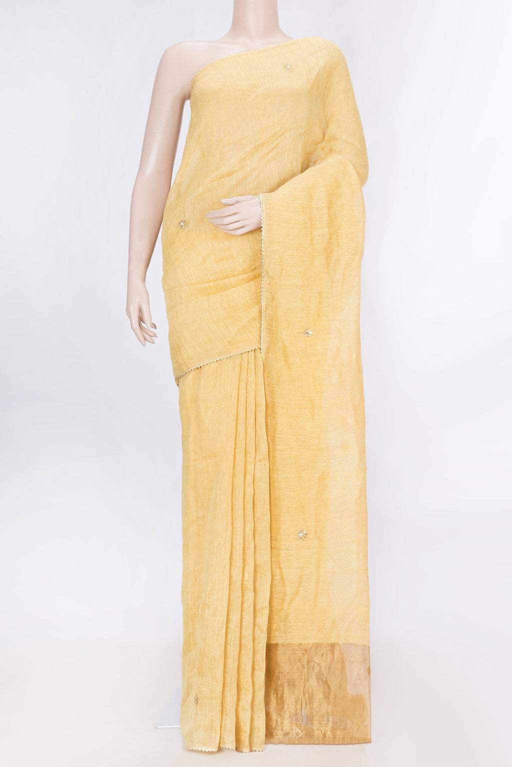 Gold Dual Tone Linen Saree with Embroidery on the body and Embroidery Border displayed on a mannequin