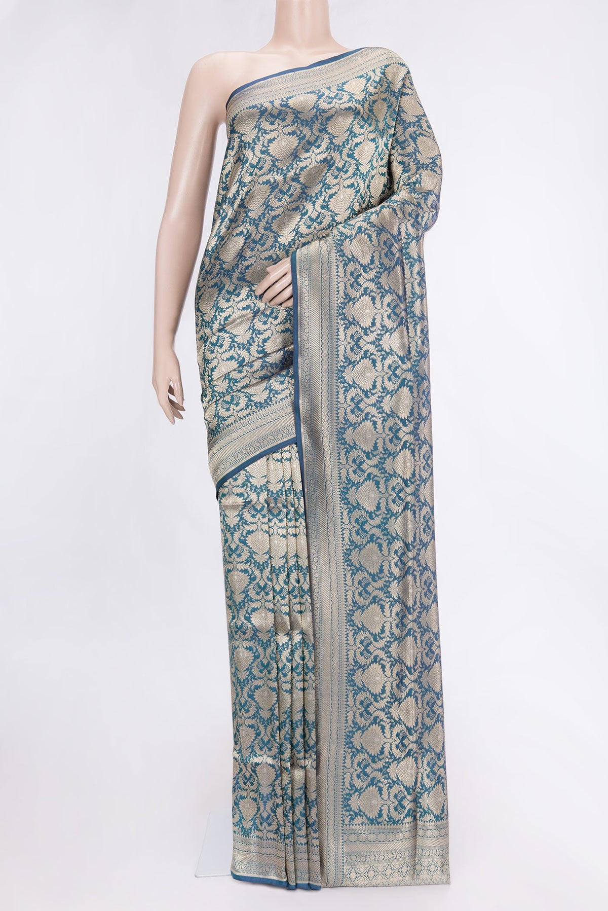 Peacock Blue Dual Tone Banarasi Silk Saree with Zari Brocade on the body and Zari Border.  displayed on a mannequin