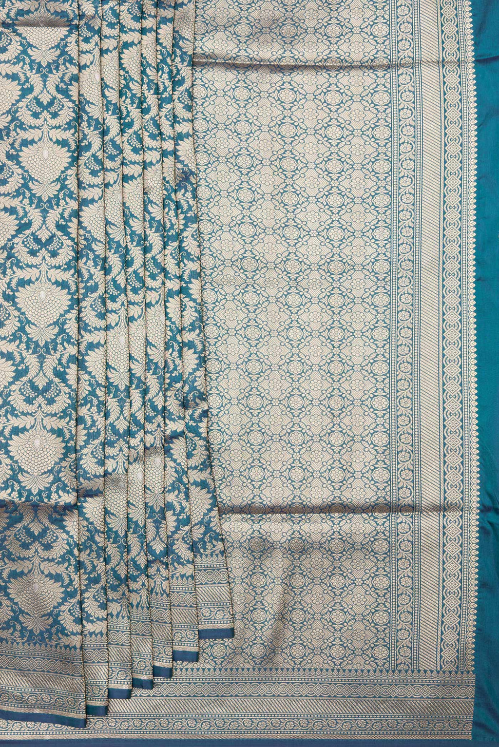 Pleats and pallu of Peacock Blue Dual Tone Banarasi Silk Saree with Zari Brocade on the body and Zari Border. 