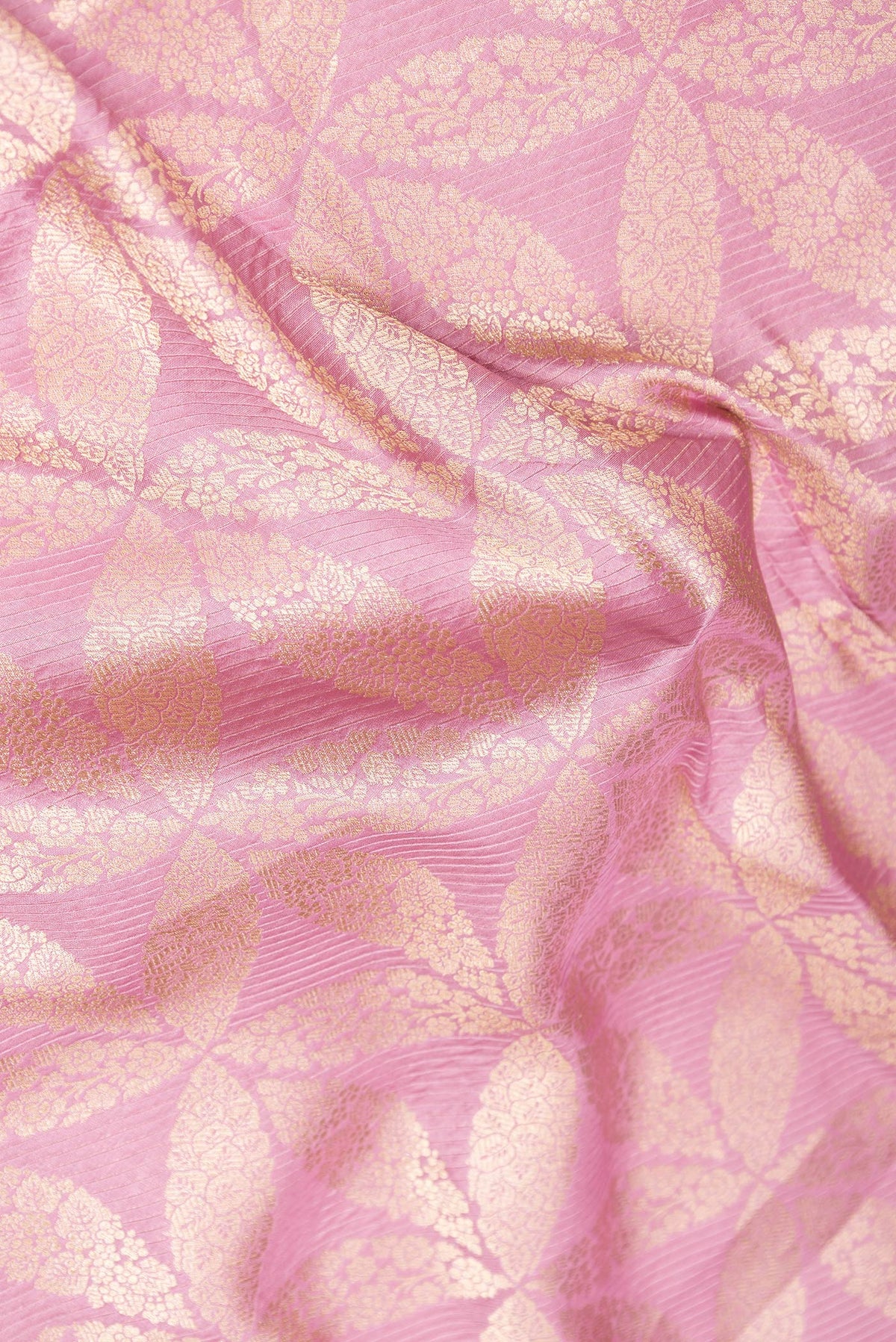 Close up of Pink Dual Tone Banarasi Silk Saree with Zari Brocade on the body and Zari Border.  displaying folds