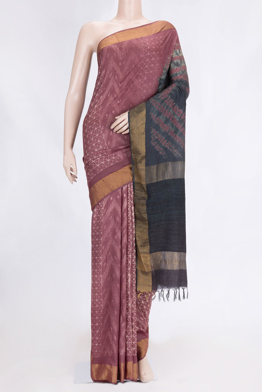 Brown Dual Tone Tussar Saree with Printed design on the body and Zari Border.  displayed on a mannequin